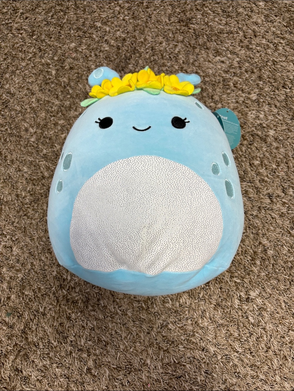 Squishmallows Light Blue Sea Creature Plush with Yellow Flower Crown